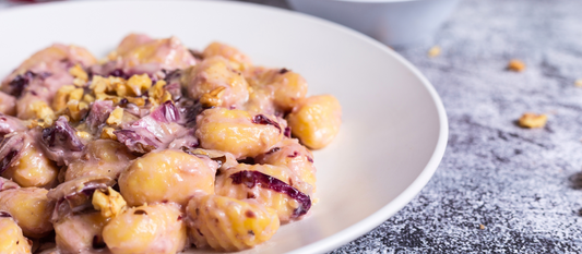 Gnocchi senza glutine e senza lattosio con crema di radicchio e noci