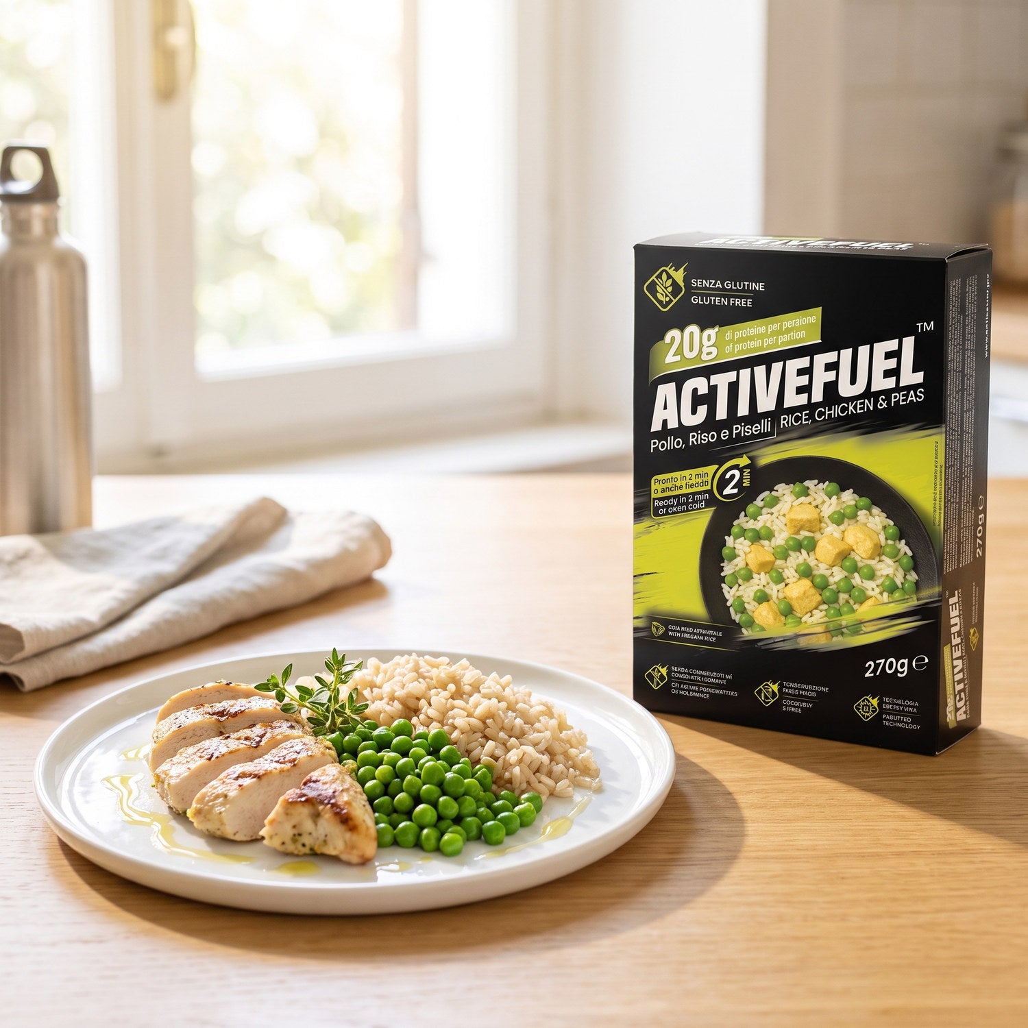 Bliss Plate Active Fuel pollo piselli e riso integrale servito nel piatto accanto alla confezione